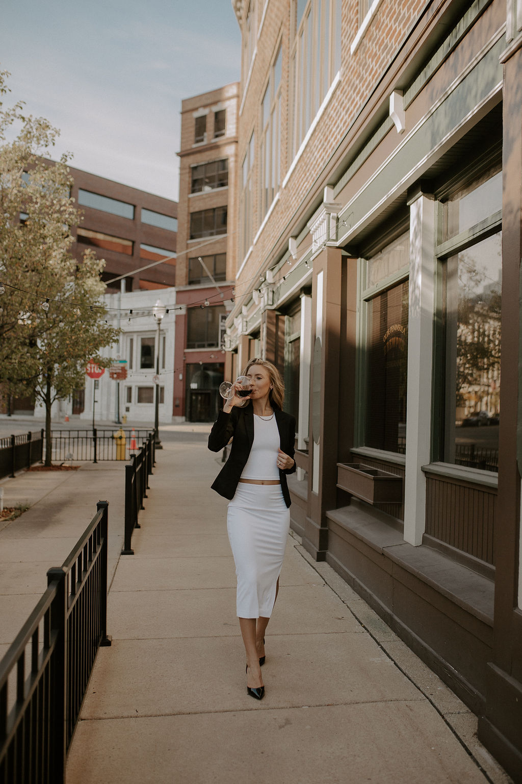 female entrepreneur walking downtown